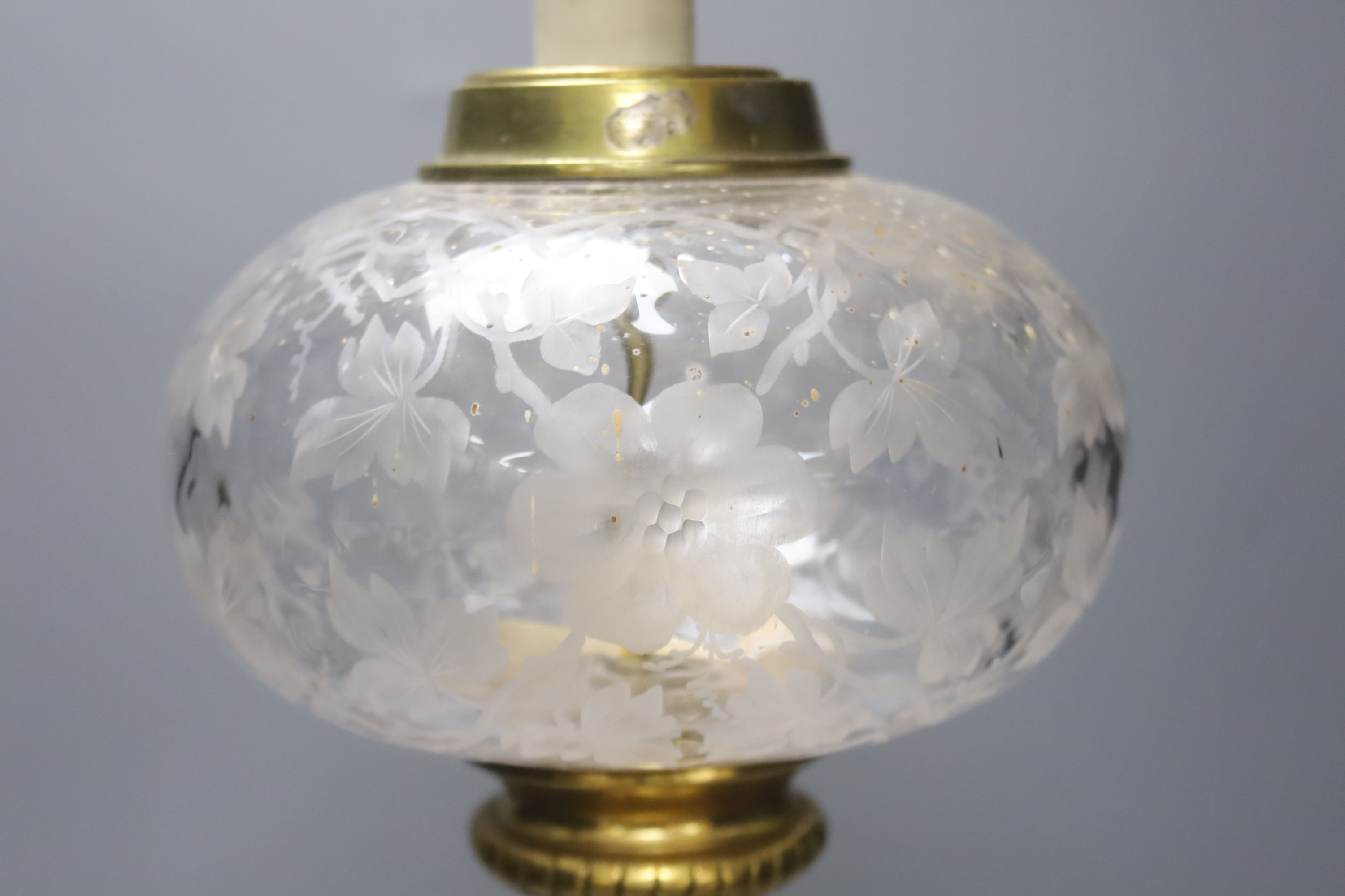 An ornate brass and glass table lamp, overall height 60cm